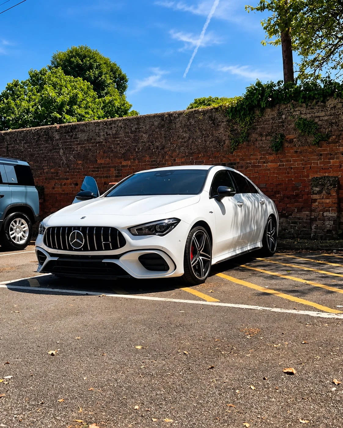 White Mercedes-AMG CLA 45 S after detailing, three-quarter front view